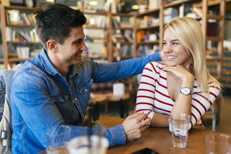 boy and girl confidently conversing with each other