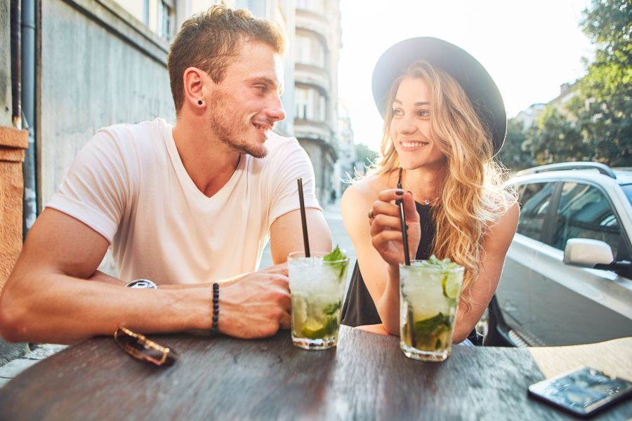 Man and woman at having a drink